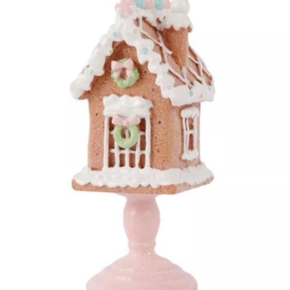 Charming Gingerbread House on Pink Stand